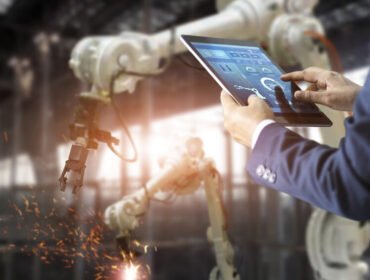 manager-industrial-engineer-using-tablet-check-control-automation-robot-arms-machine-banner